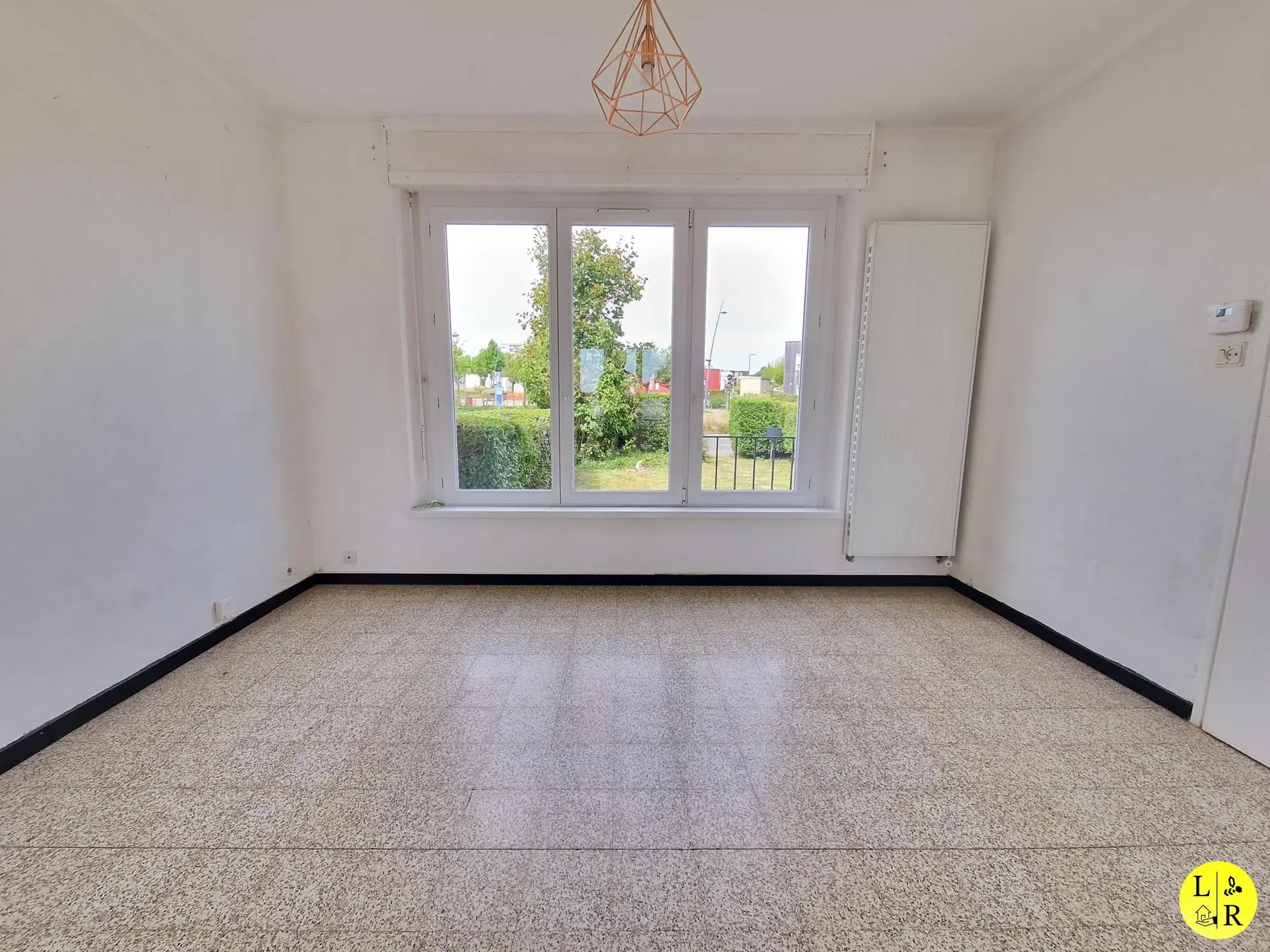 Maison mitoyenne 3 chambres avec jardin et garage à Arras 