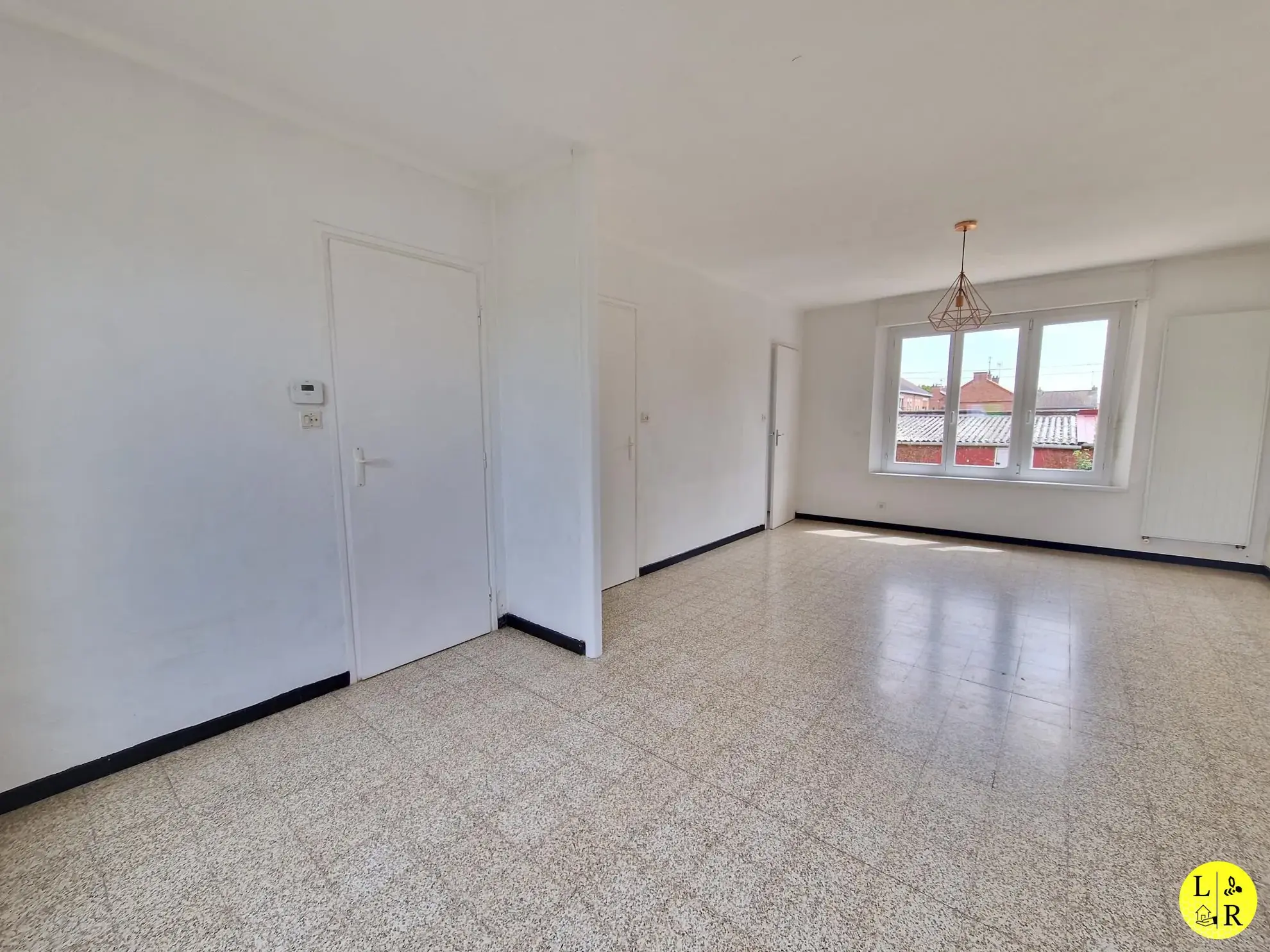 Maison mitoyenne 3 chambres avec jardin et garage à Arras 