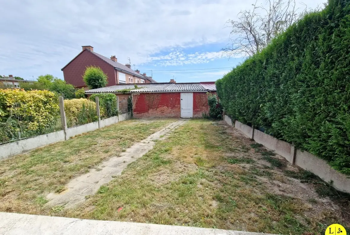 Maison mitoyenne 3 chambres avec jardin et garage à Arras 