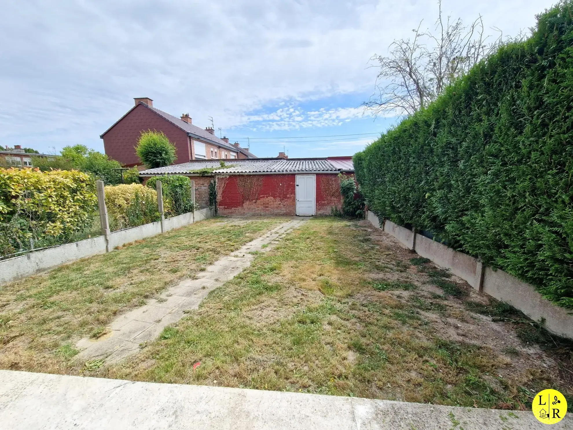 Maison mitoyenne 3 chambres avec jardin et garage à Arras 