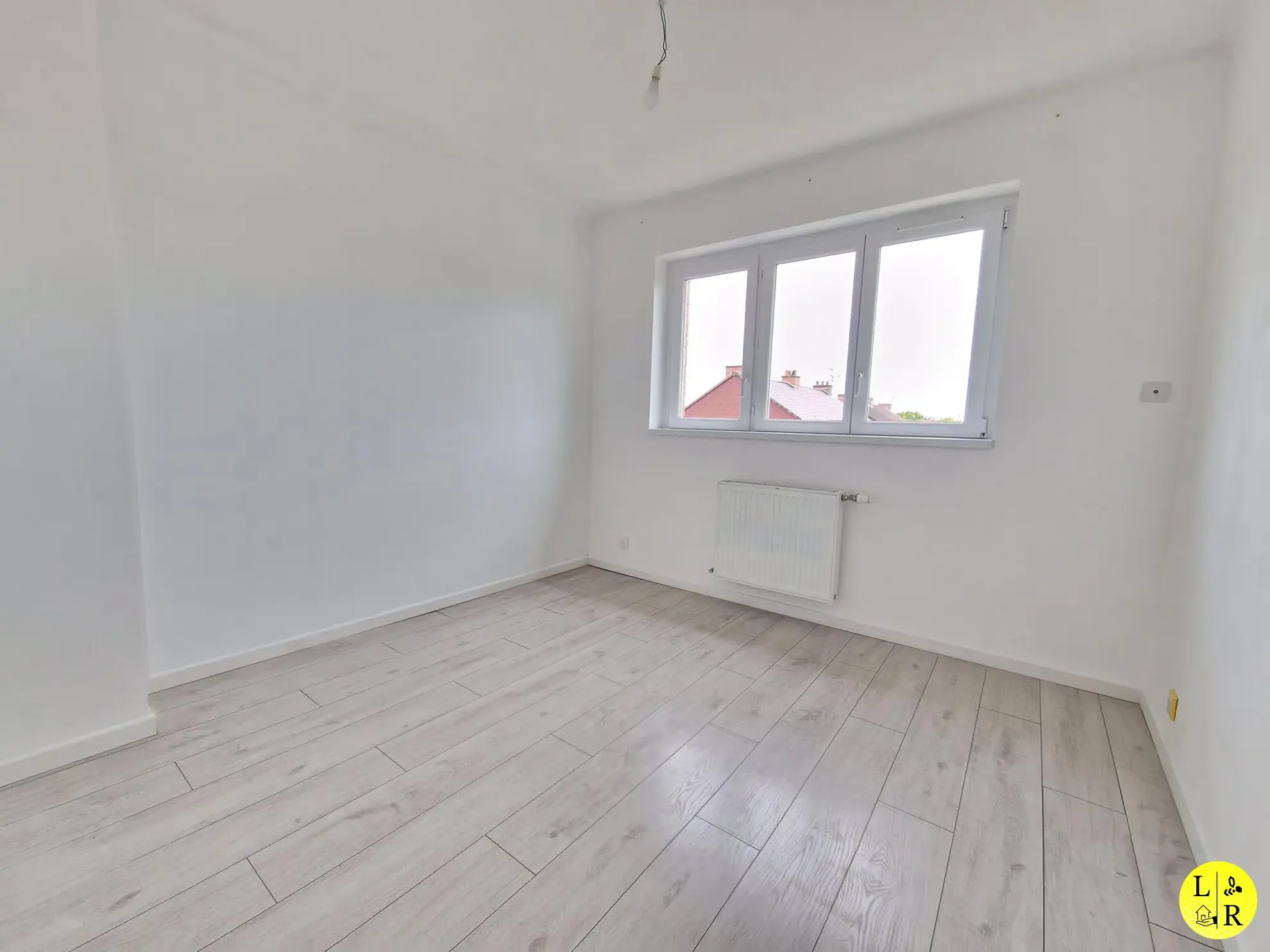 Maison mitoyenne 3 chambres avec jardin et garage à Arras 