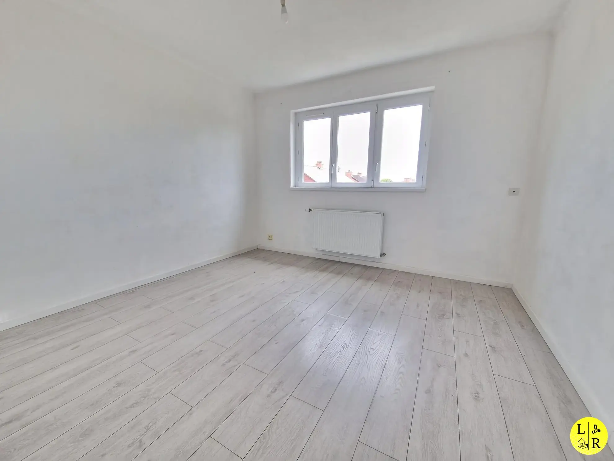 Maison mitoyenne 3 chambres avec jardin et garage à Arras 