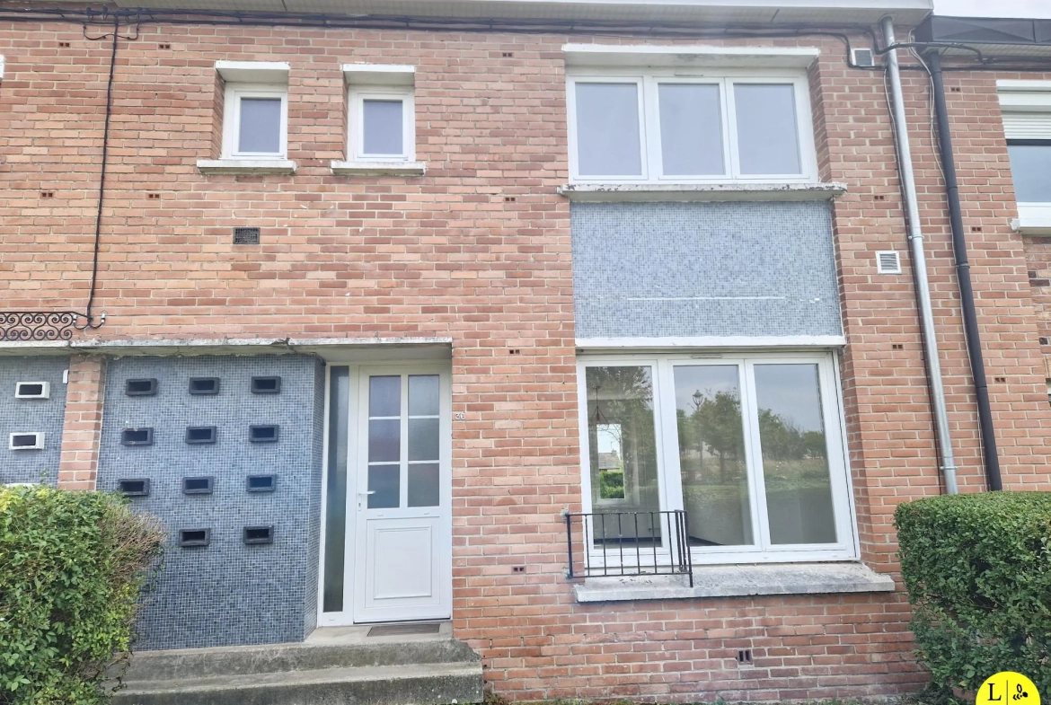 Maison mitoyenne 3 chambres avec jardin et garage à Arras 