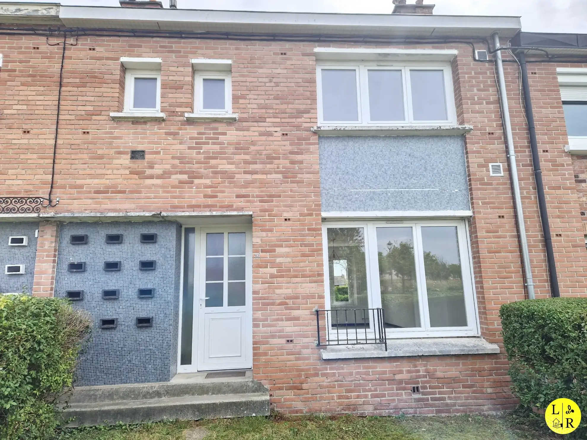 Maison mitoyenne 3 chambres avec jardin et garage à Arras 