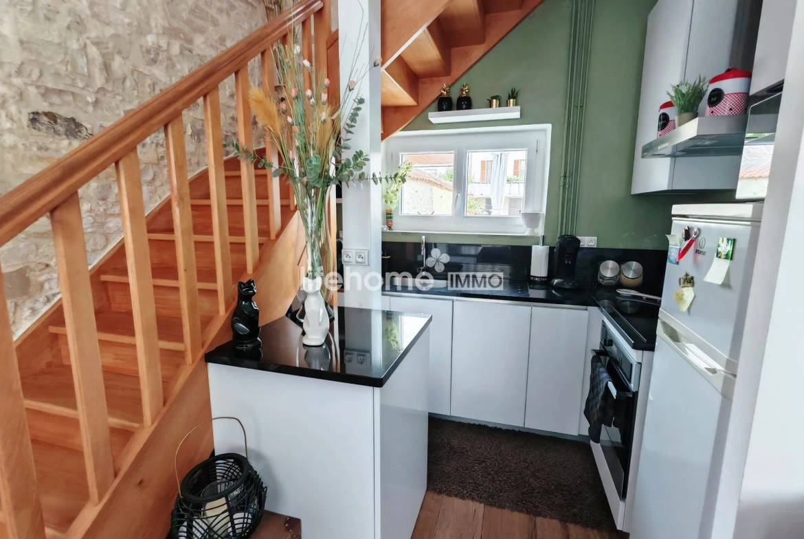 Maison à Châteauroux avec jardin, deux chambres et cave, parfait pour habitation ou investissement 