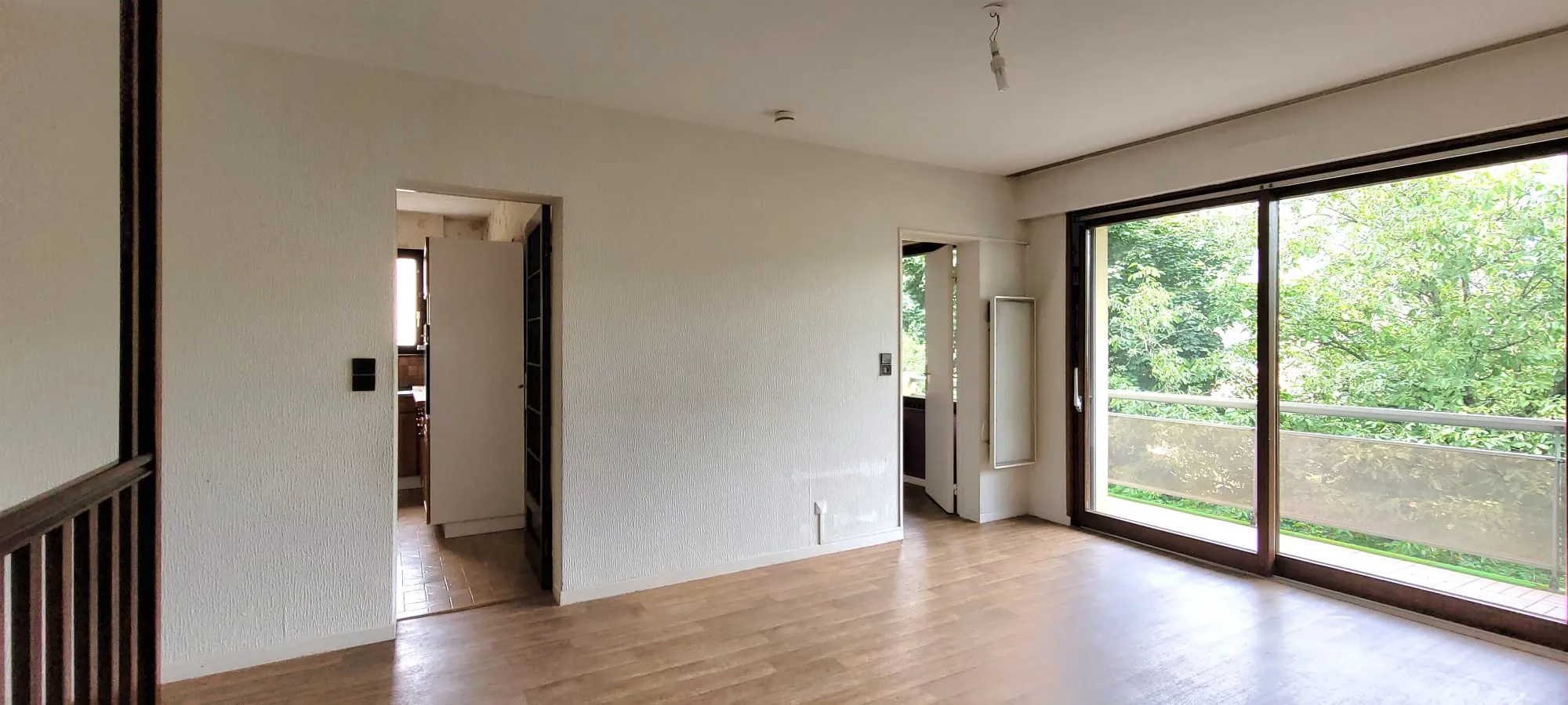 Souplex à Saint-Dié-des-Vosges avec balcon, cave et garage - 3 chambres 