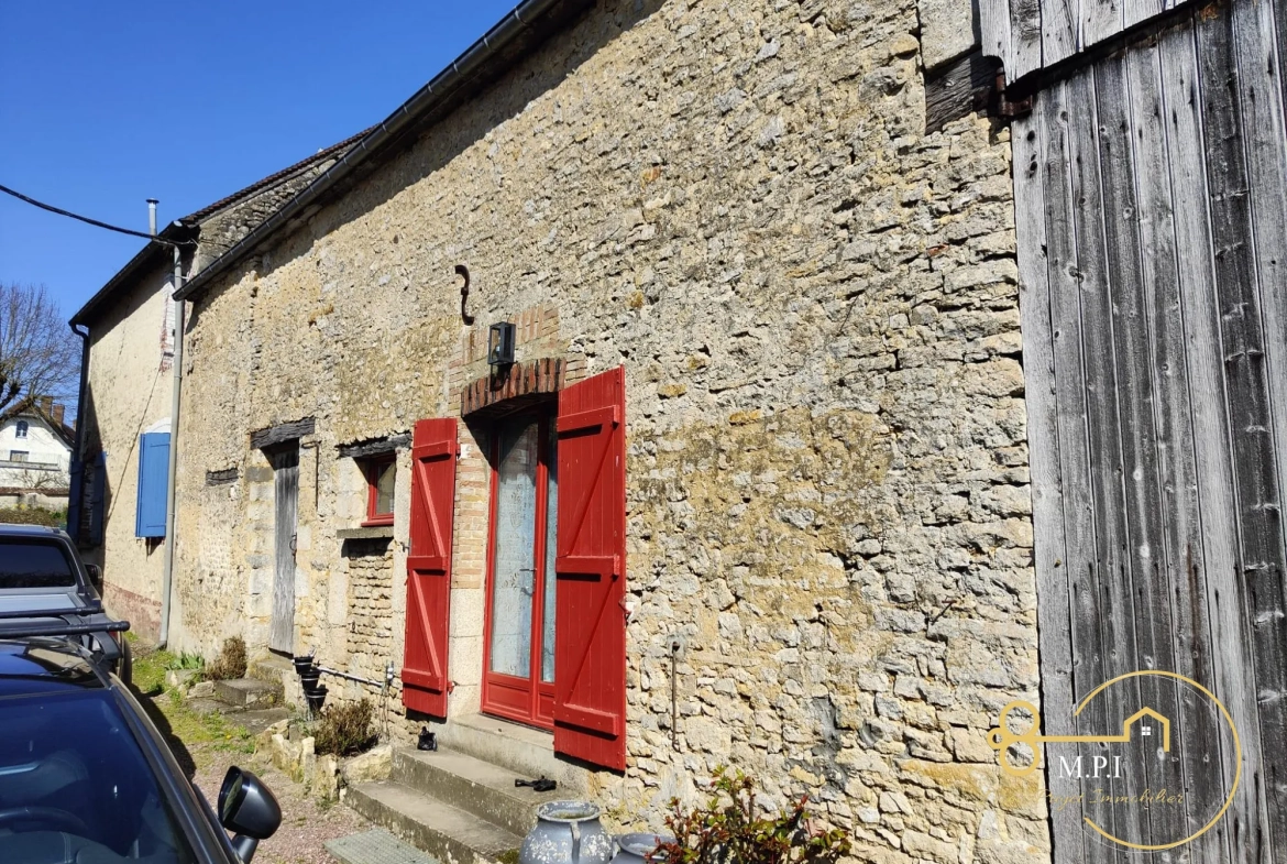 Ensemble immobilier avec appartements, dépendances et terrain à vendre à Essay 