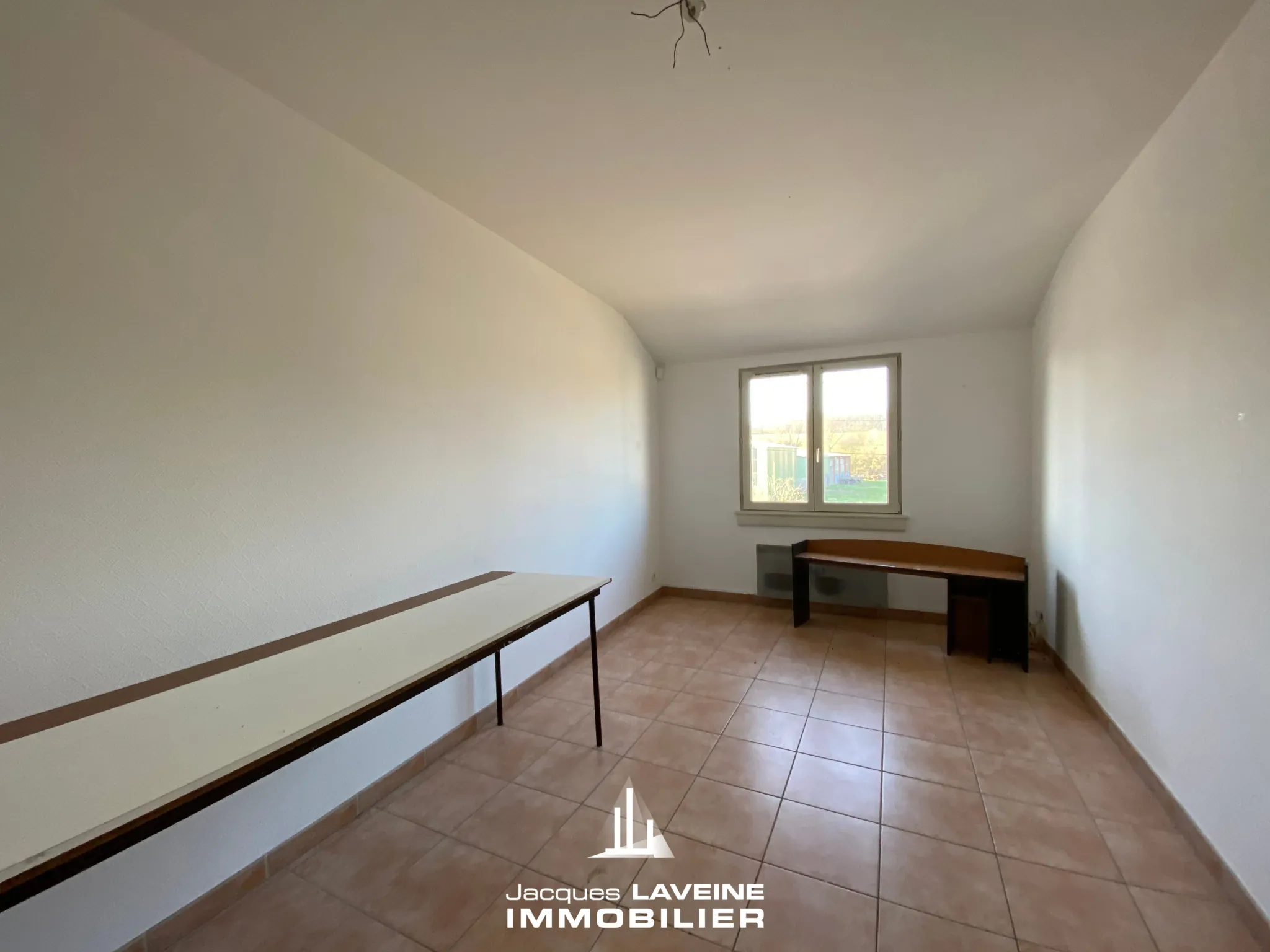 Ensemble immobilier à Sorbey à 15 km de Metz avec 2 maisons, 9 pièces et garages 