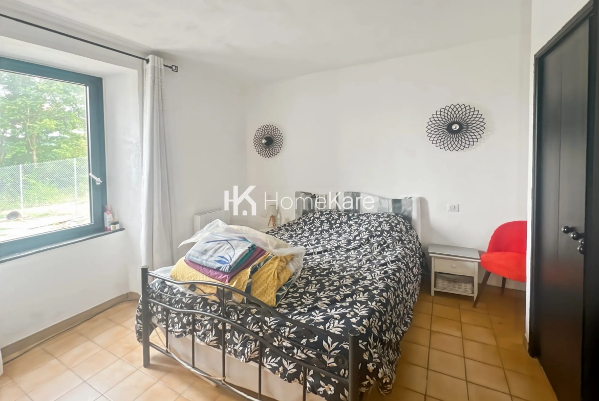 Maison à vendre à Saint-Marcet avec terrain de 3500 m², cadre naturel et travaux récents 