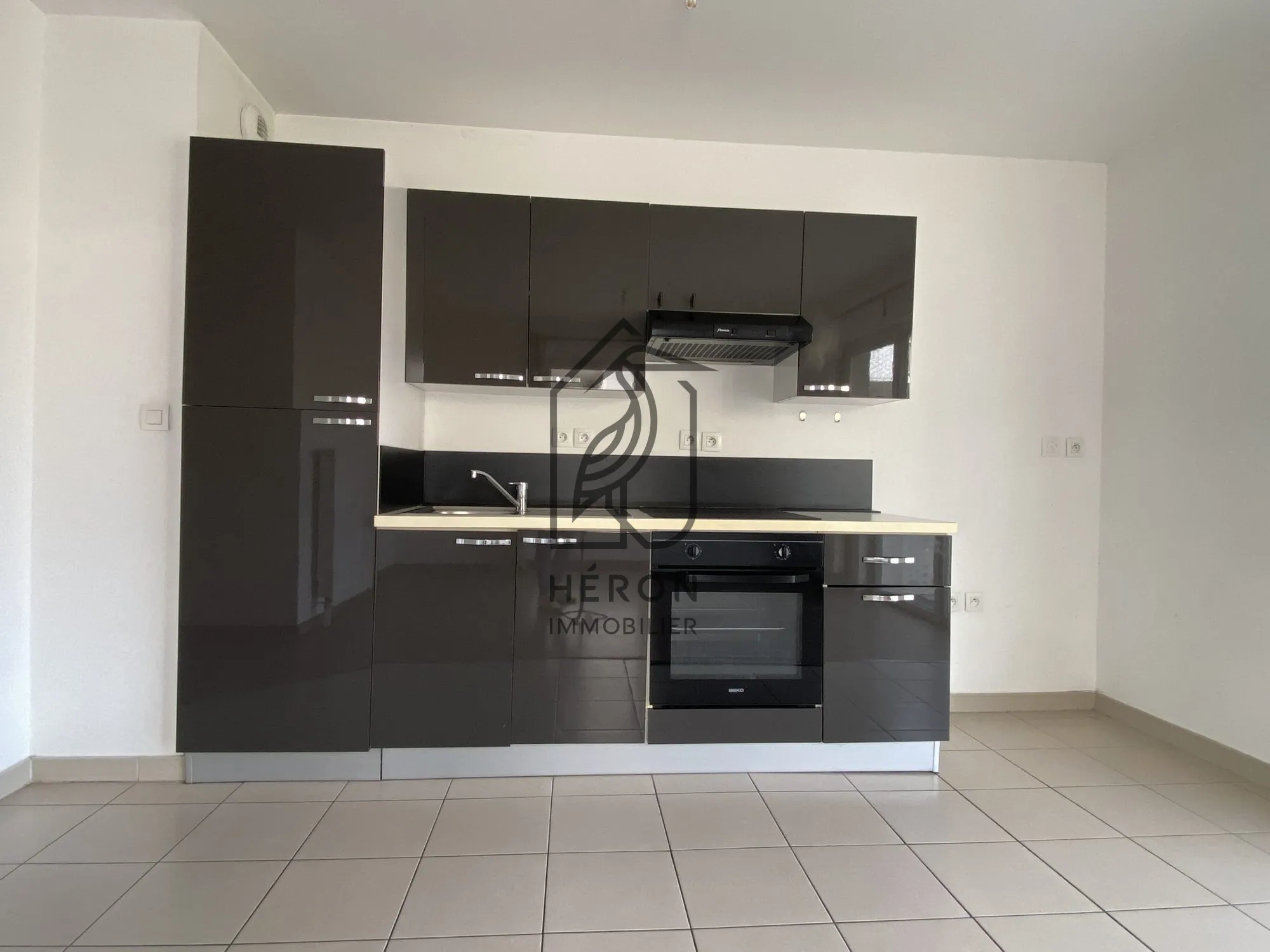 Appartement T2 avec balcon et parking sécurisé à Roubaix centre 