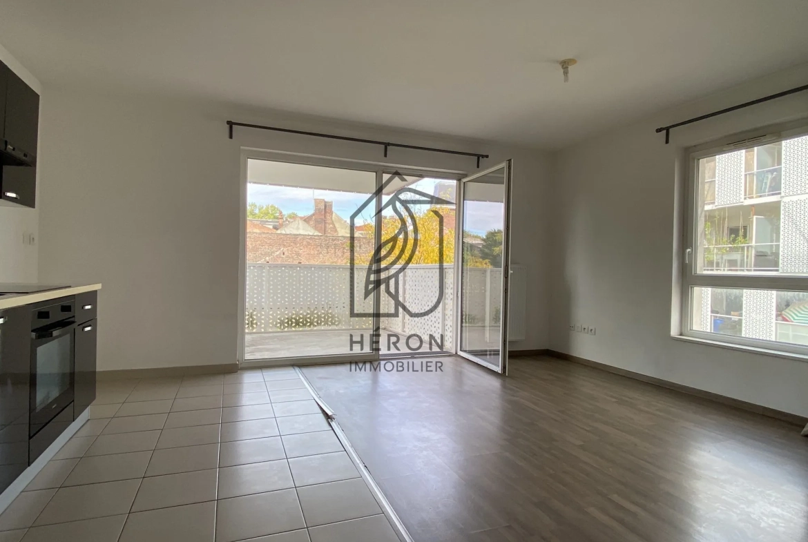 Appartement T2 avec balcon et parking sécurisé à Roubaix centre 
