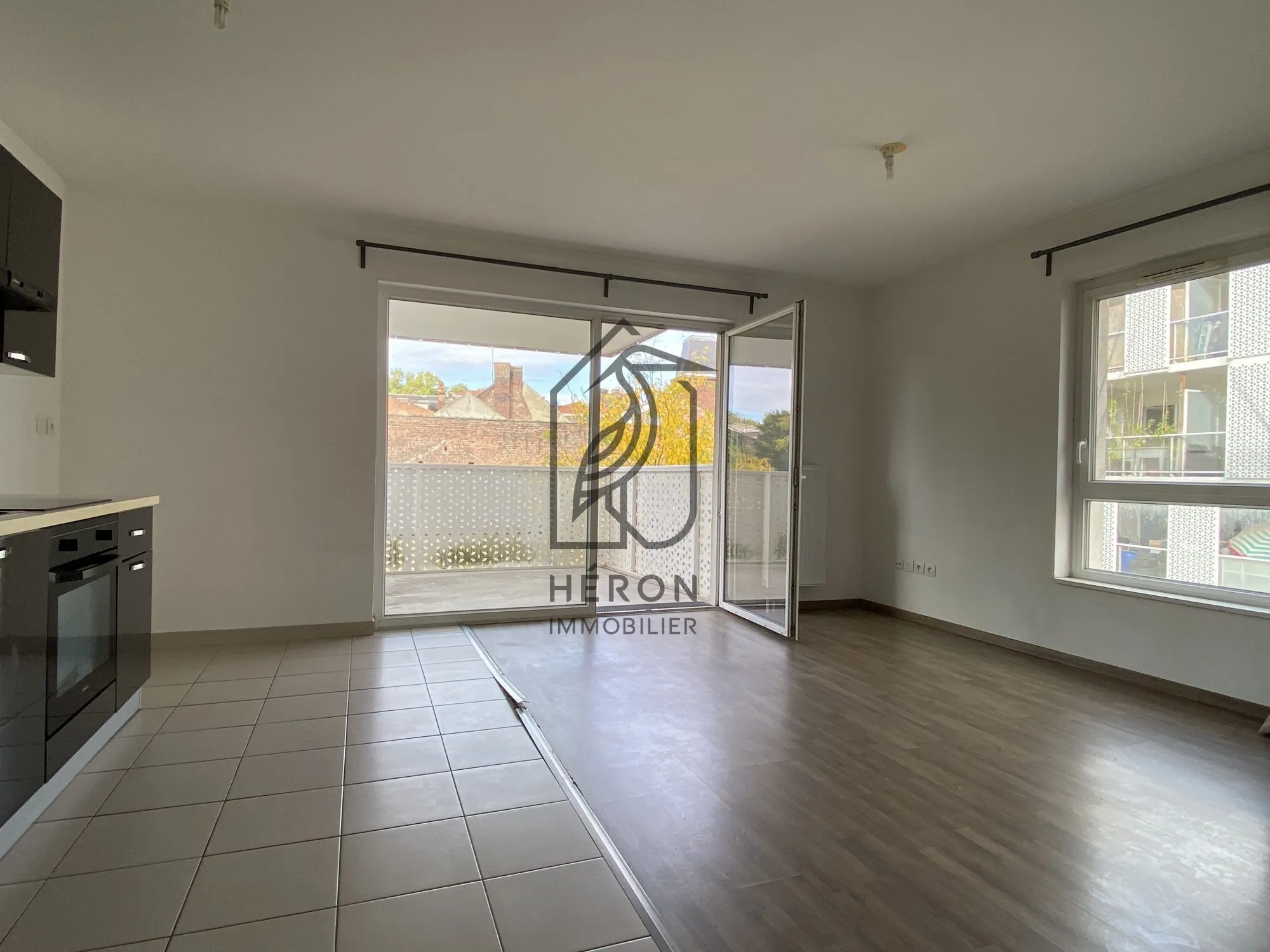 Appartement T2 avec balcon et parking sécurisé à Roubaix centre 