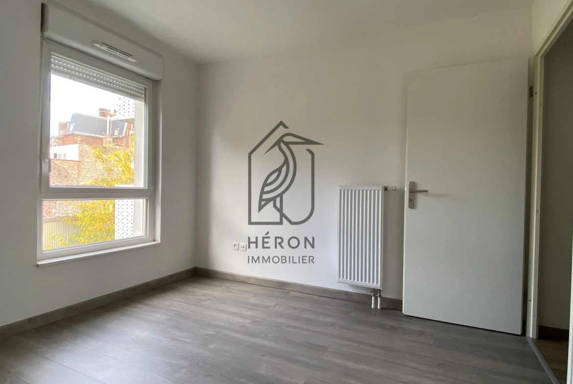 Appartement T2 avec balcon et parking sécurisé à Roubaix centre 
