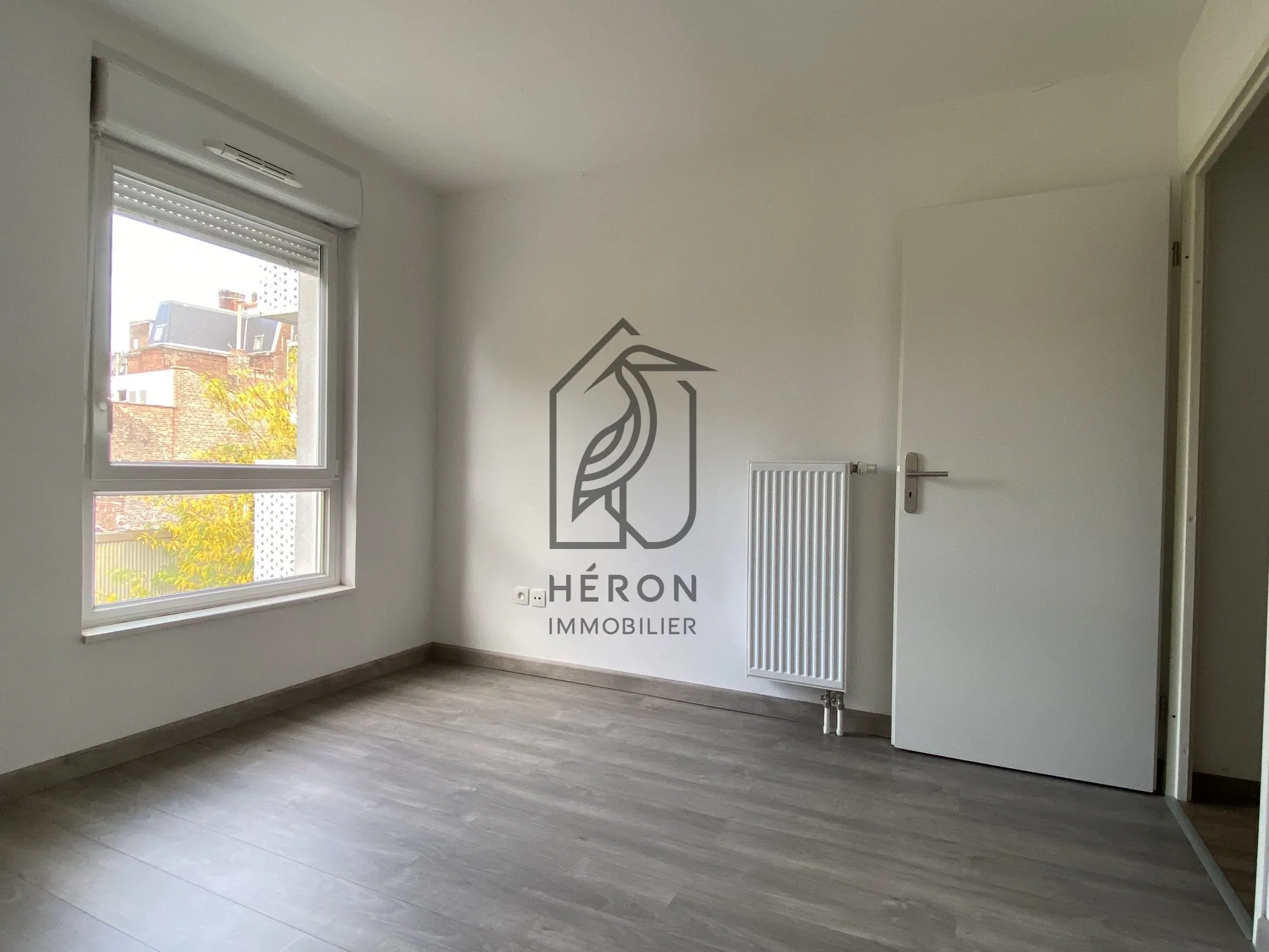 Appartement T2 avec balcon et parking sécurisé à Roubaix centre 