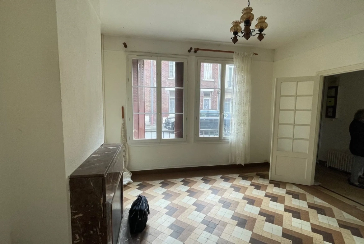 Maison à vendre à Nesle avec jardin et potentiel de rénovation 