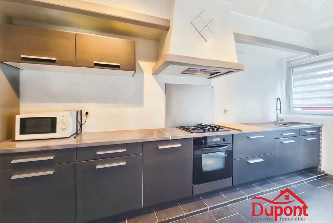 Maison mitoyenne 2 chambres avec terrasse à Bertry - Immobilier résidentiel 