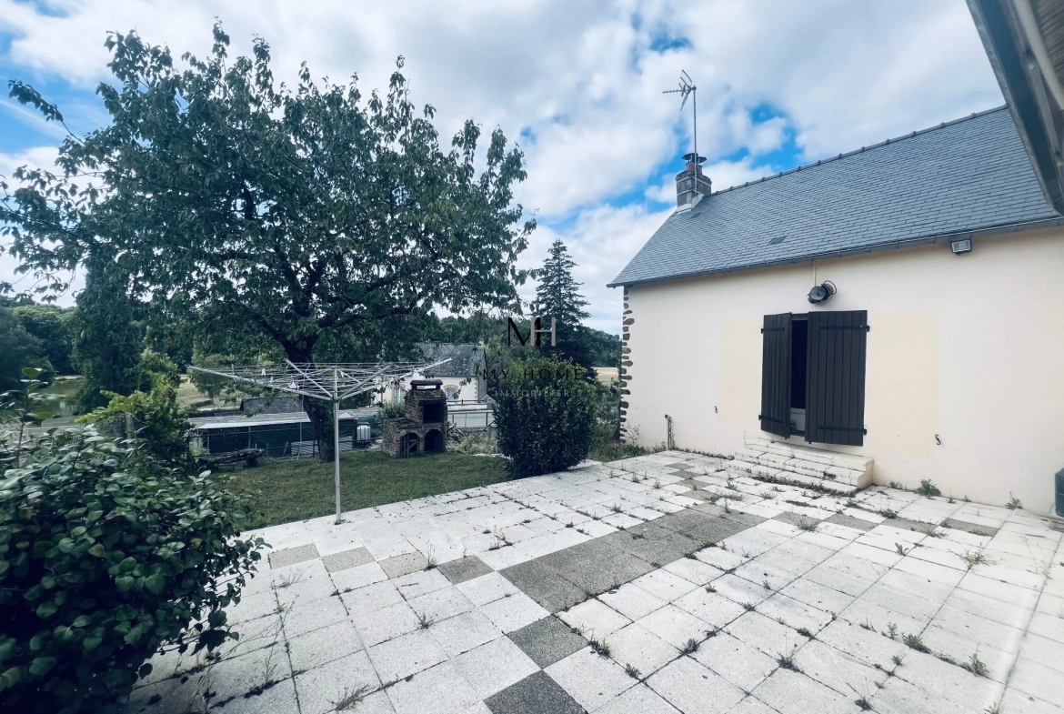 Charmante maison ancienne de 121 m² avec jardin et garage à Saint-Léonard-des-Bois 