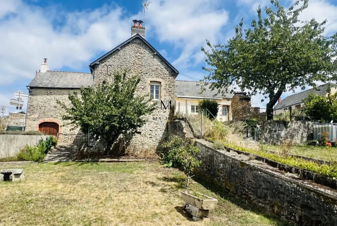 Charmante maison ancienne de 121 m² avec jardin et garage à Saint-Léonard-des-Bois 
