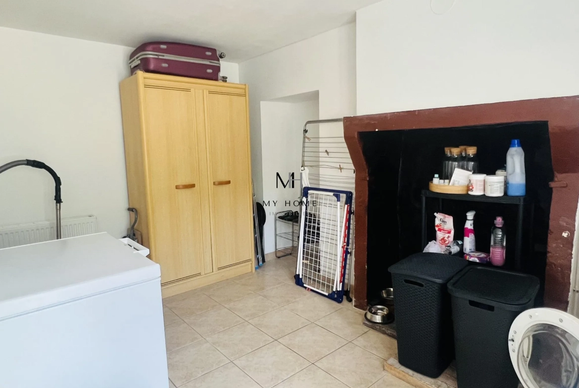 Charmante maison ancienne de 121 m² avec jardin et garage à Saint-Léonard-des-Bois 