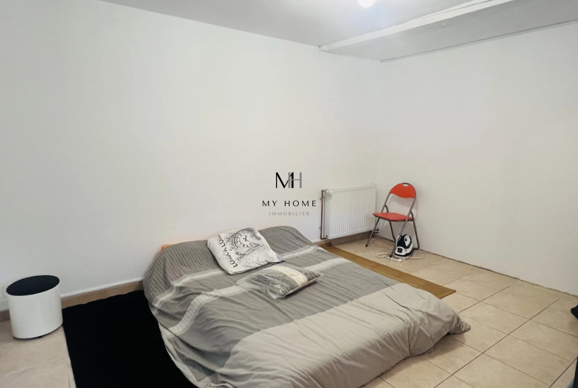 Charmante maison ancienne de 121 m² avec jardin et garage à Saint-Léonard-des-Bois 