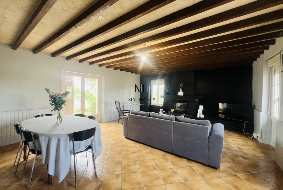 Charmante maison ancienne de 121 m² avec jardin et garage à Saint-Léonard-des-Bois 