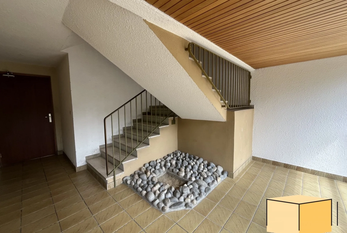 Appartement T2 avec cave et garage à Belley, idéal investisseur ou résident 