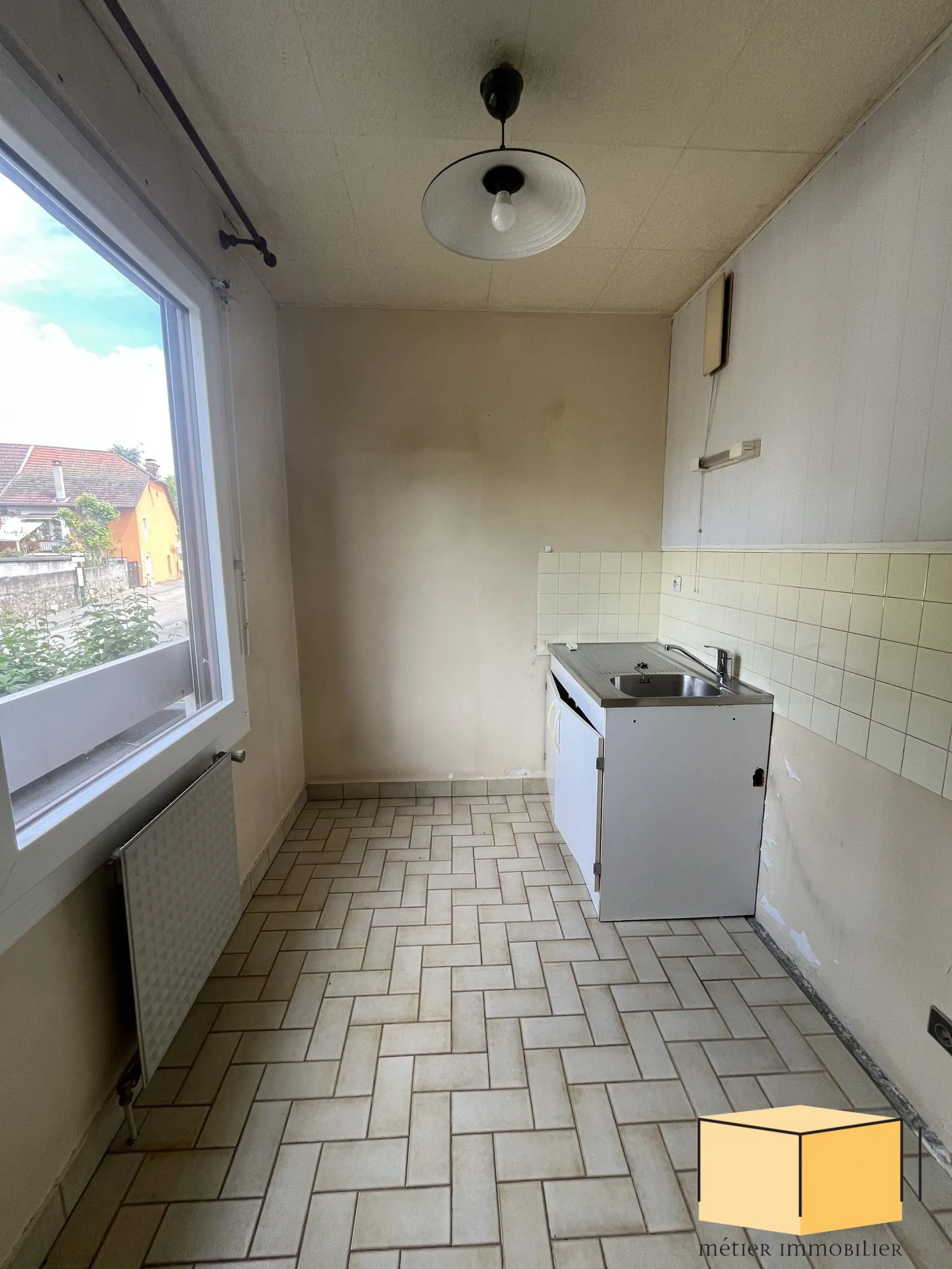 Appartement T2 avec cave et garage à Belley, idéal investisseur ou résident 