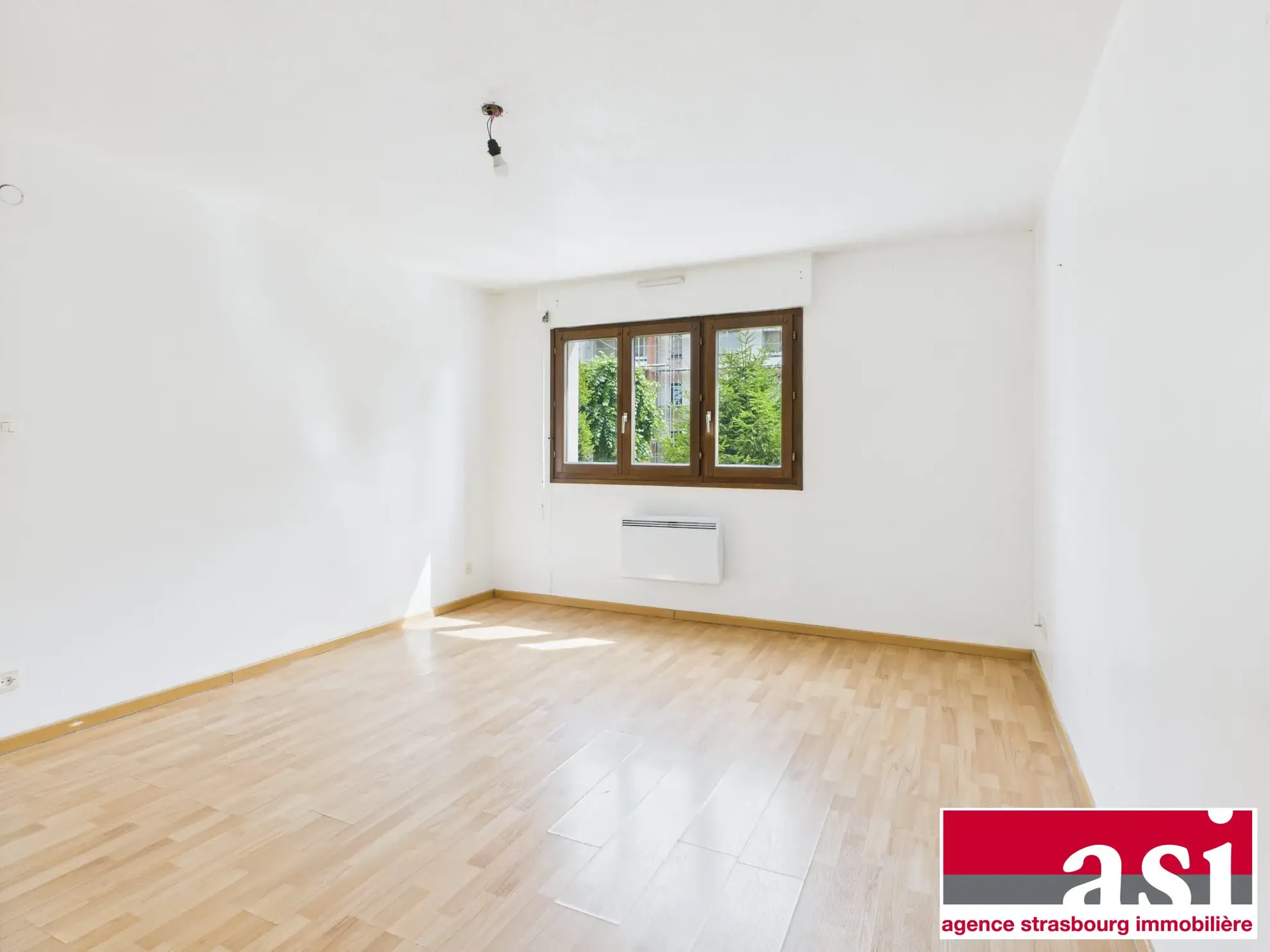 Vente d'un appartement 1 pièce de 31m² avec cave et parking à Strasbourg Neudorf 