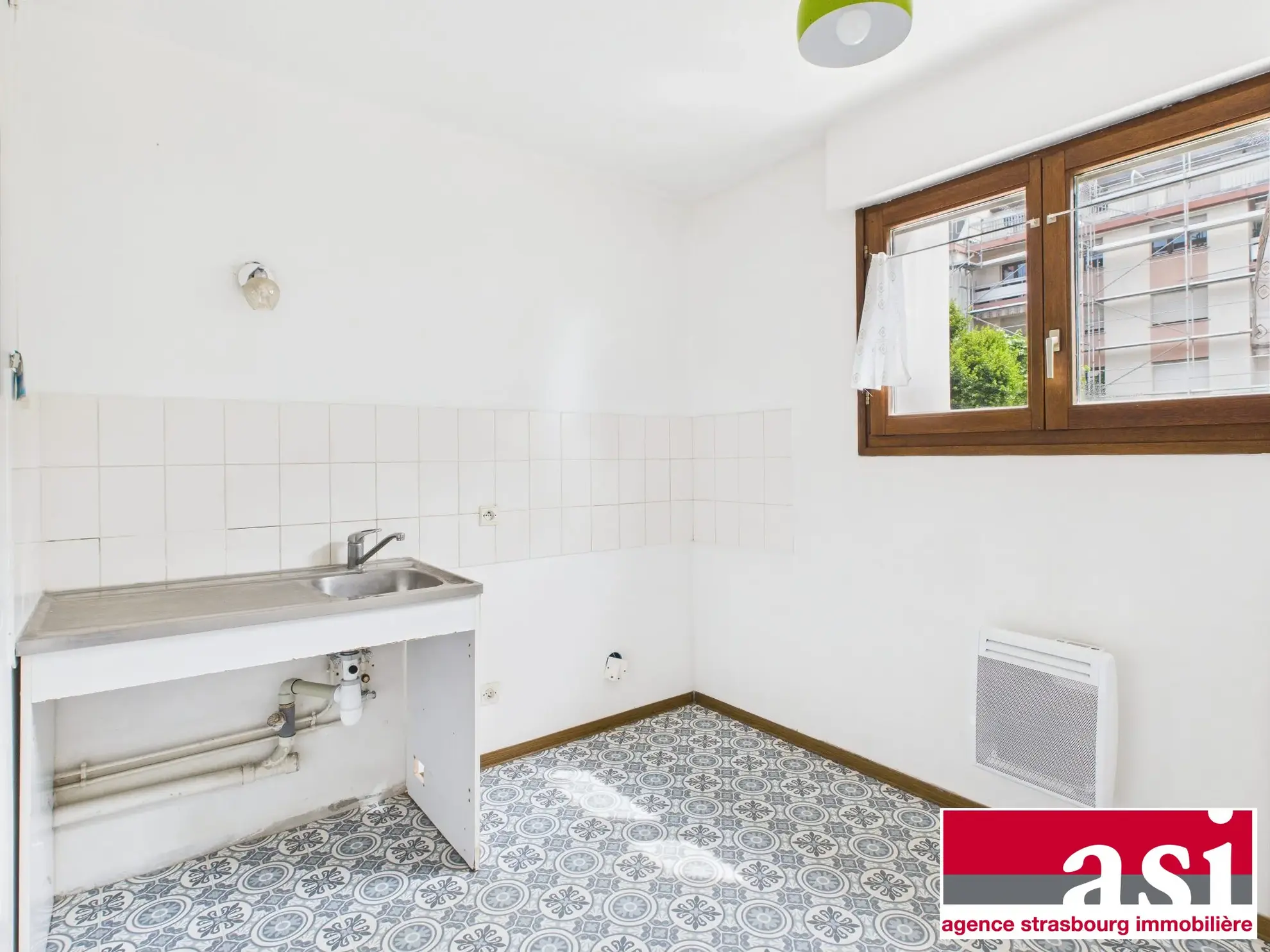 Vente d'un appartement 1 pièce de 31m² avec cave et parking à Strasbourg Neudorf 