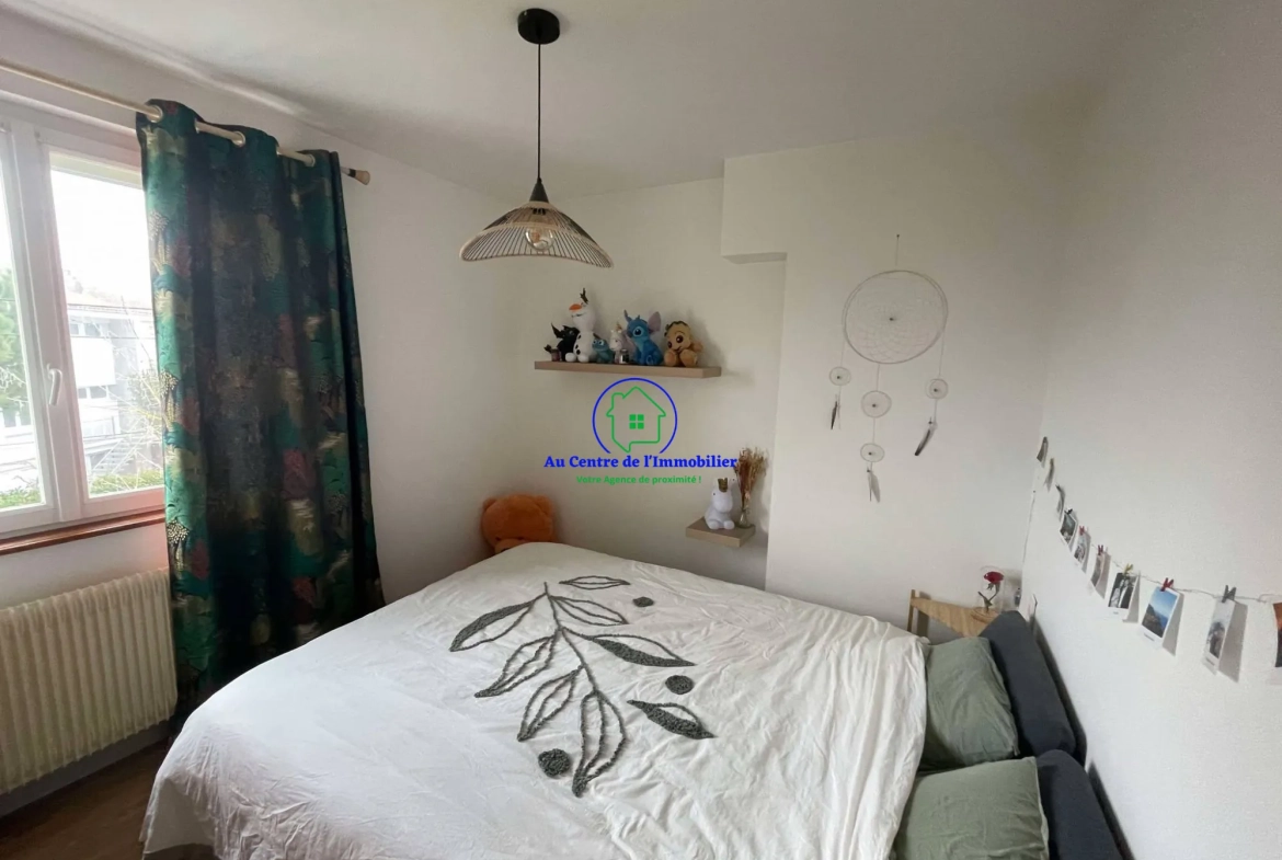 Maison de ville avec jardin, terrasse et garages à vendre à Agen 