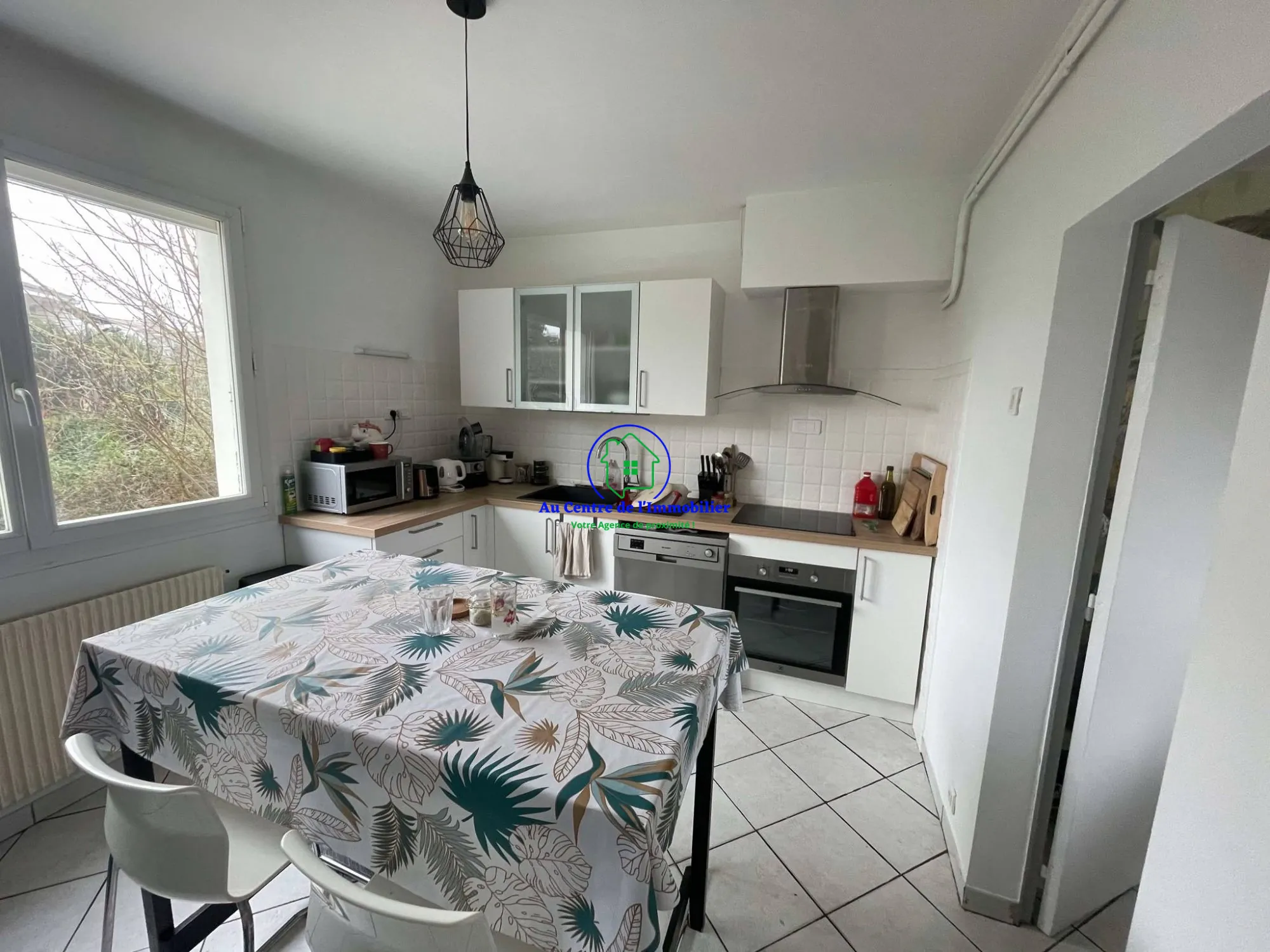 Maison de ville avec jardin, terrasse et garages à vendre à Agen 