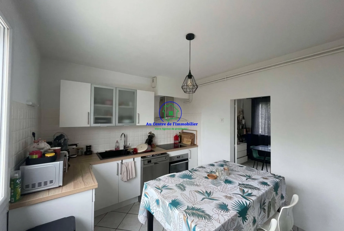Maison de ville avec jardin, terrasse et garages à vendre à Agen 