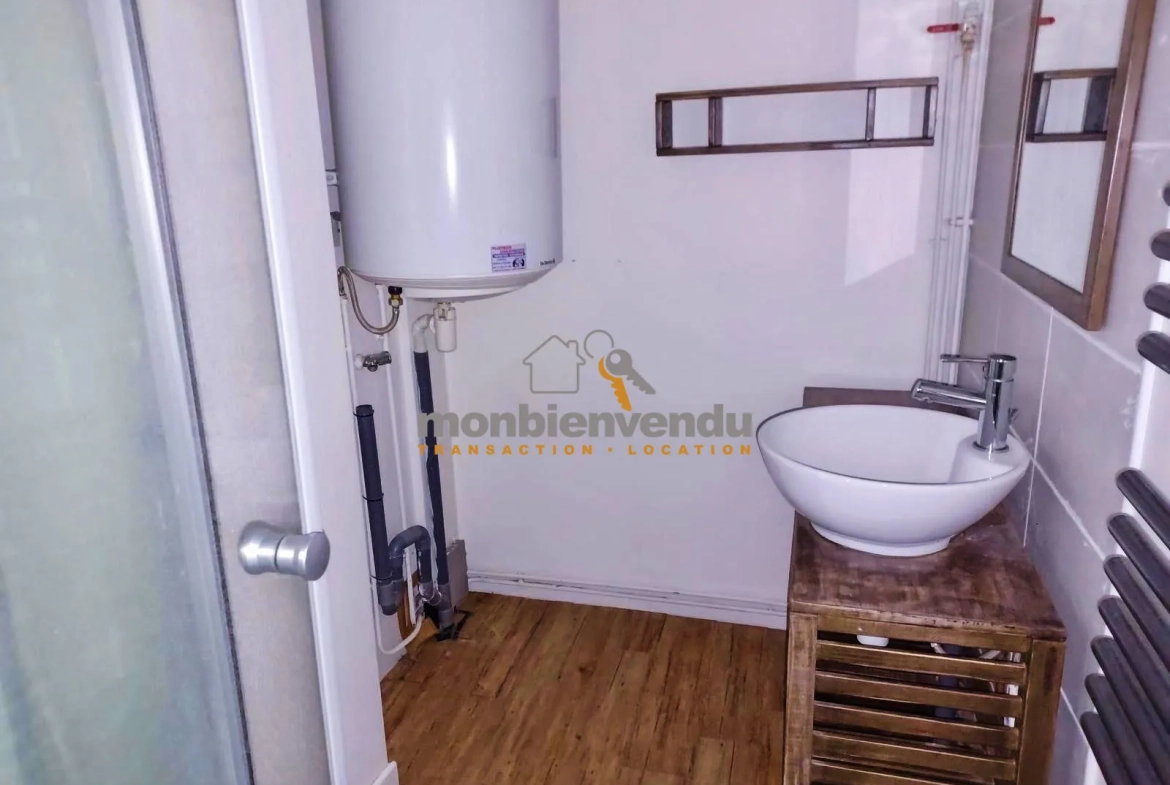 Appartement T1 bis à vendre à Aurillac - 31 m² avec coin nuit 