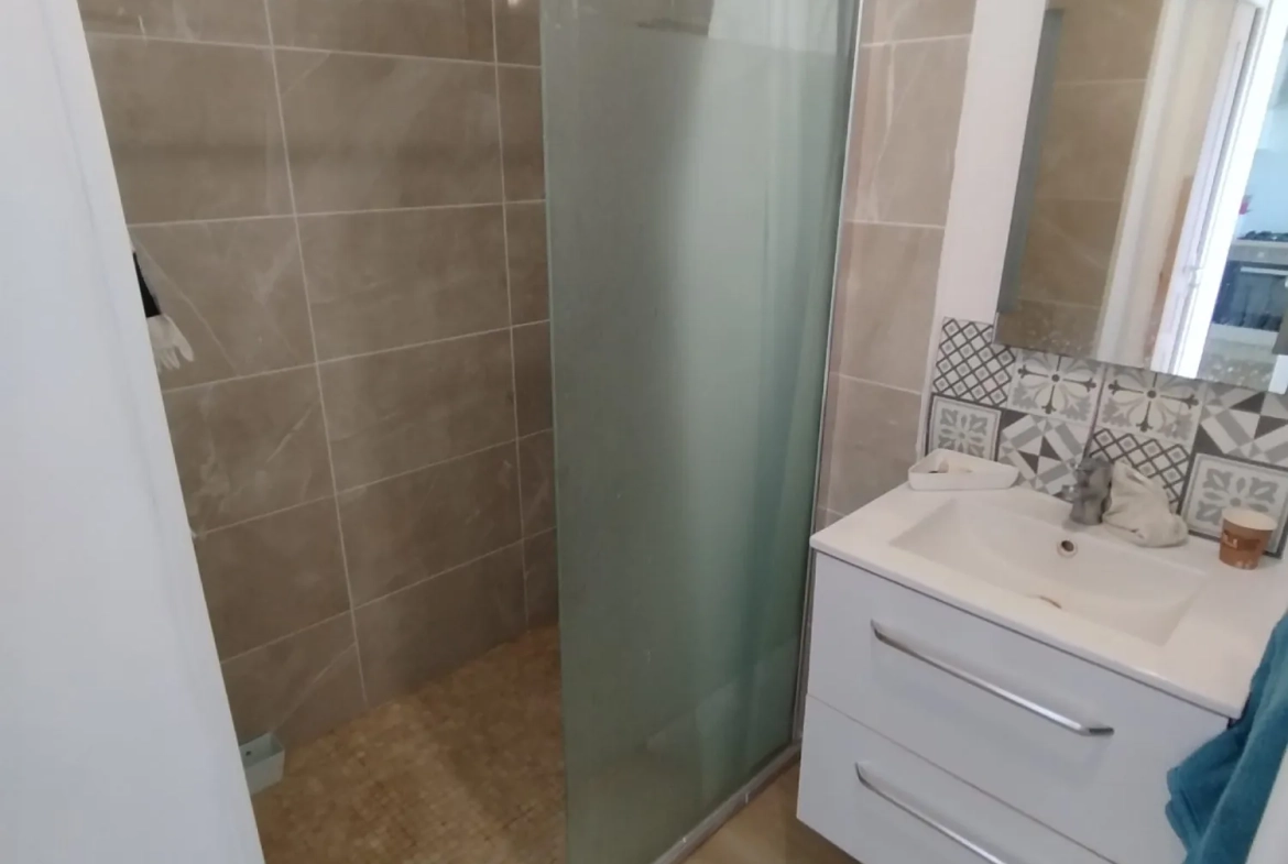 Maison à vendre à Saint-Amand-les-Eaux - 70 m², 2 chambres, jardin et cave 