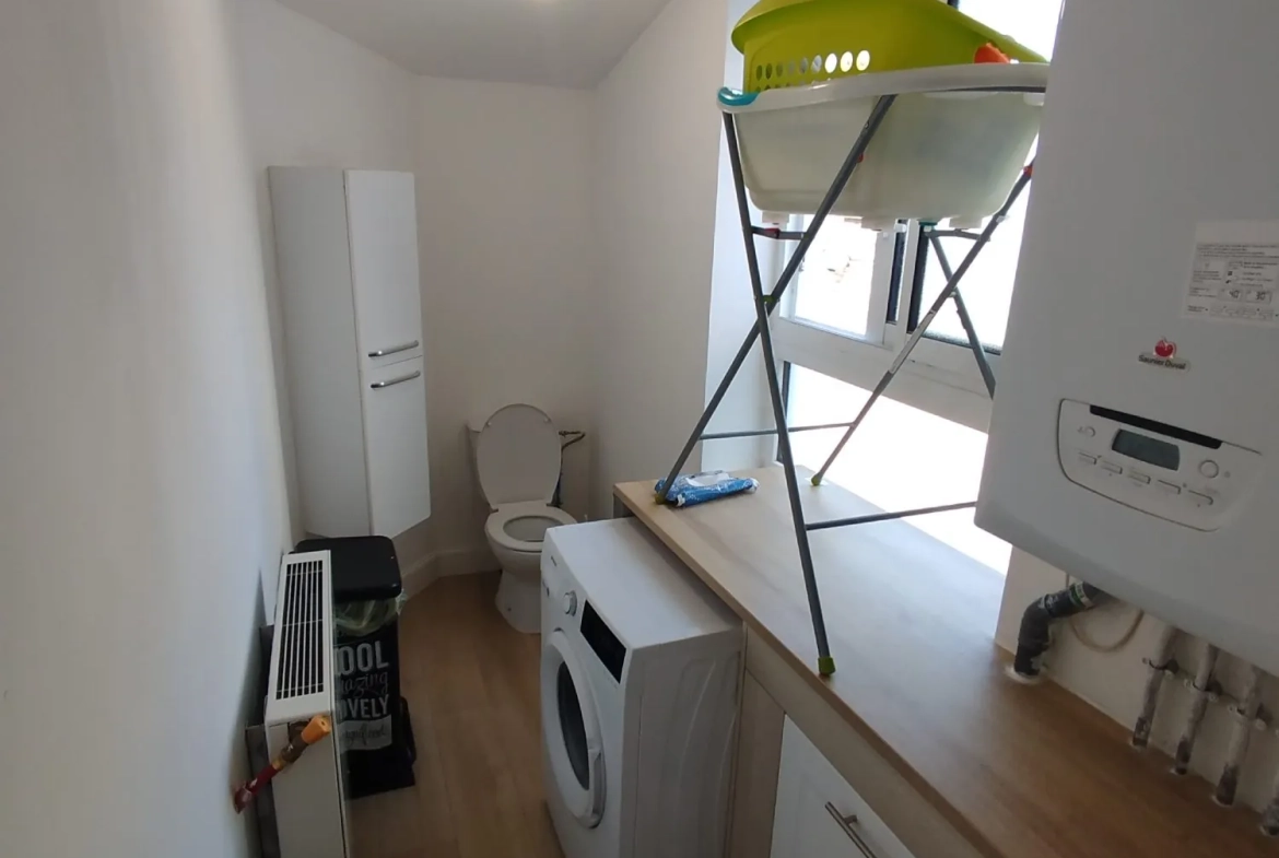 Maison à vendre à Saint-Amand-les-Eaux - 70 m², 2 chambres, jardin et cave 