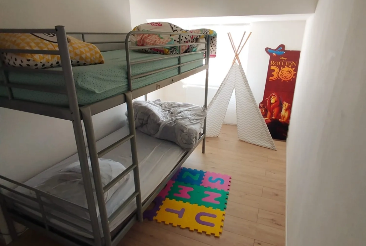 Maison à vendre à Saint-Amand-les-Eaux - 70 m², 2 chambres, jardin et cave 