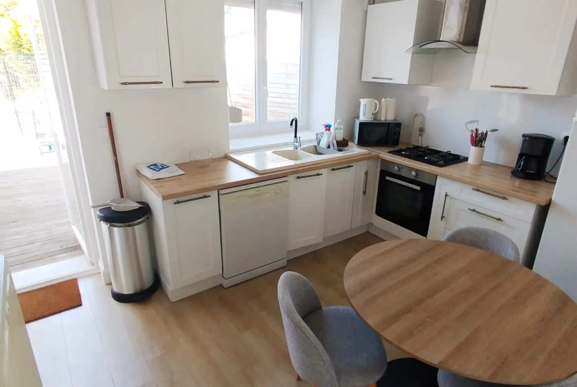 Maison à vendre à Saint-Amand-les-Eaux - 70 m², 2 chambres, jardin et cave 