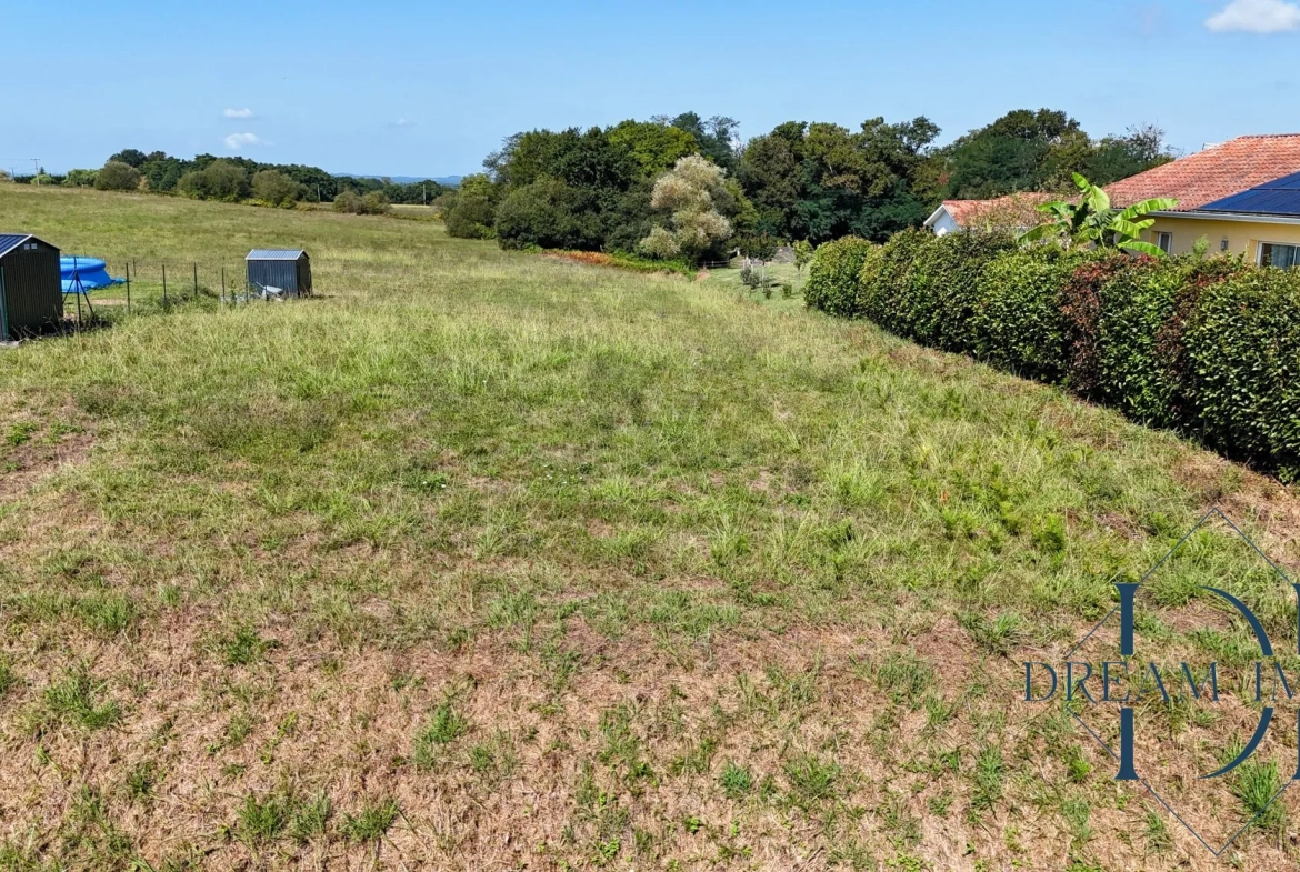 Terrain constructible avec vue campagne à Bélus - 826 m² prêt à bâtir 