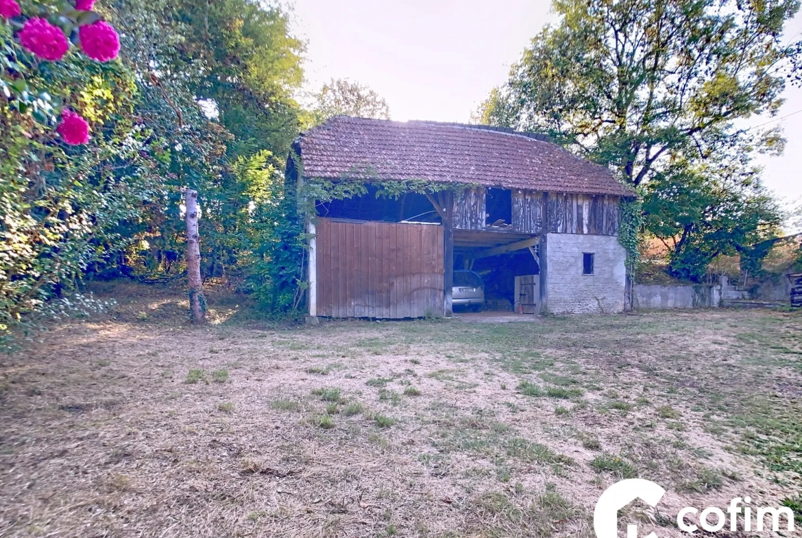 Maison à vendre à Garlin avec terrain, grange et puits en Béarn 