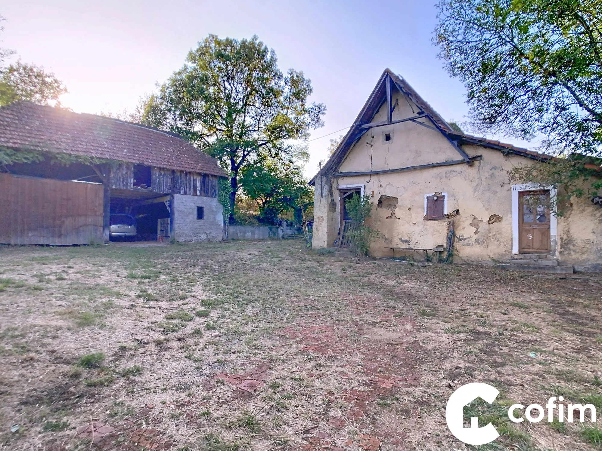 Maison à vendre à Garlin avec terrain, grange et puits en Béarn 