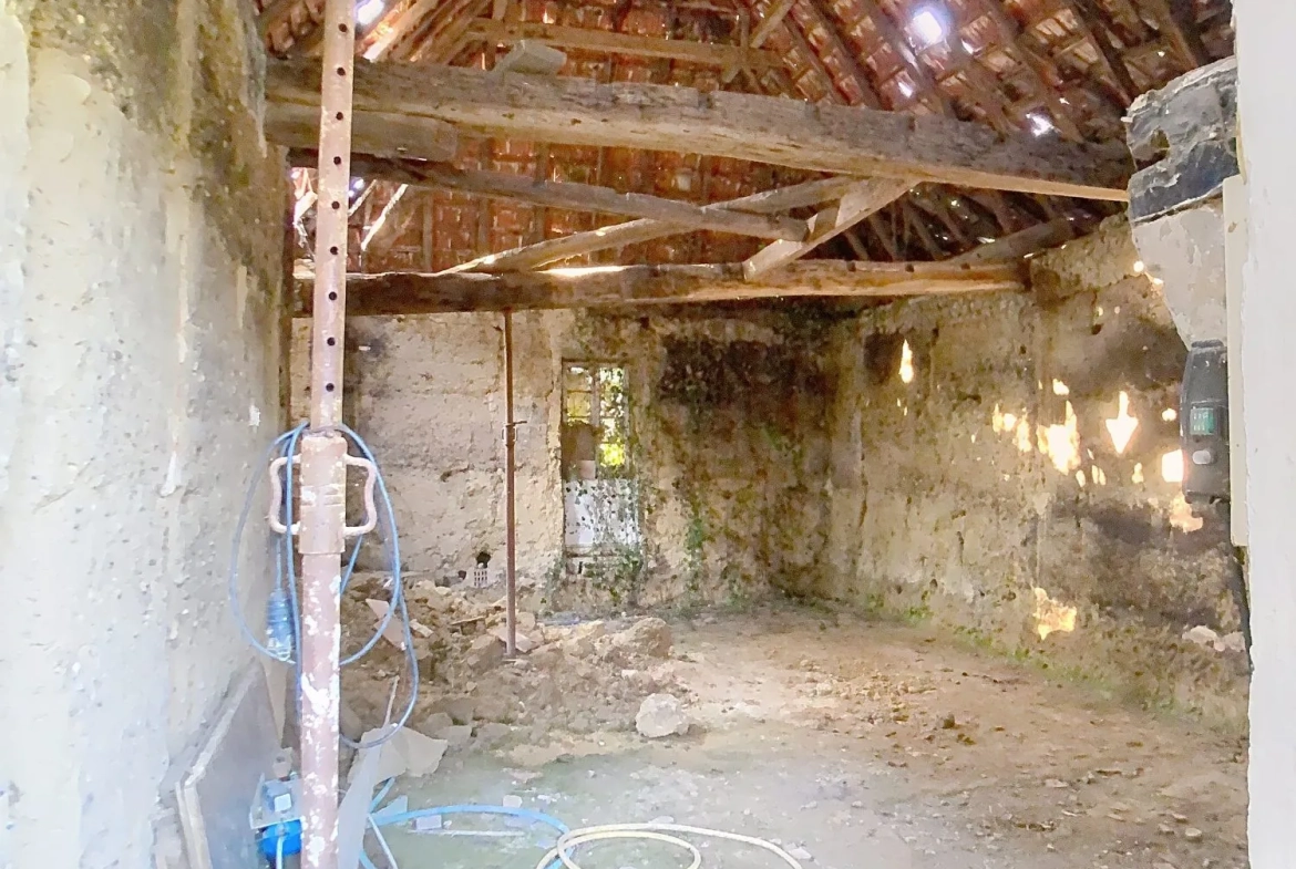 Maison à vendre à Garlin avec terrain, grange et puits en Béarn 