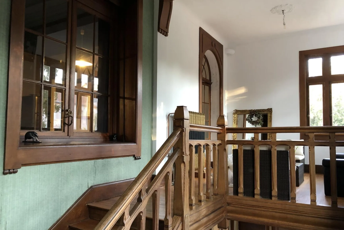 Appartement atypique avec duplex, terrasse et garage à Thaon-les-Vosges 