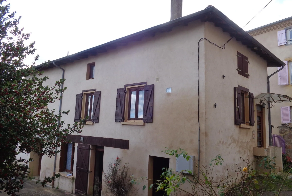 Maison à vendre avec jardin, garage et potentiel d'aménagement à Saint-Nizier-d'Azergues 