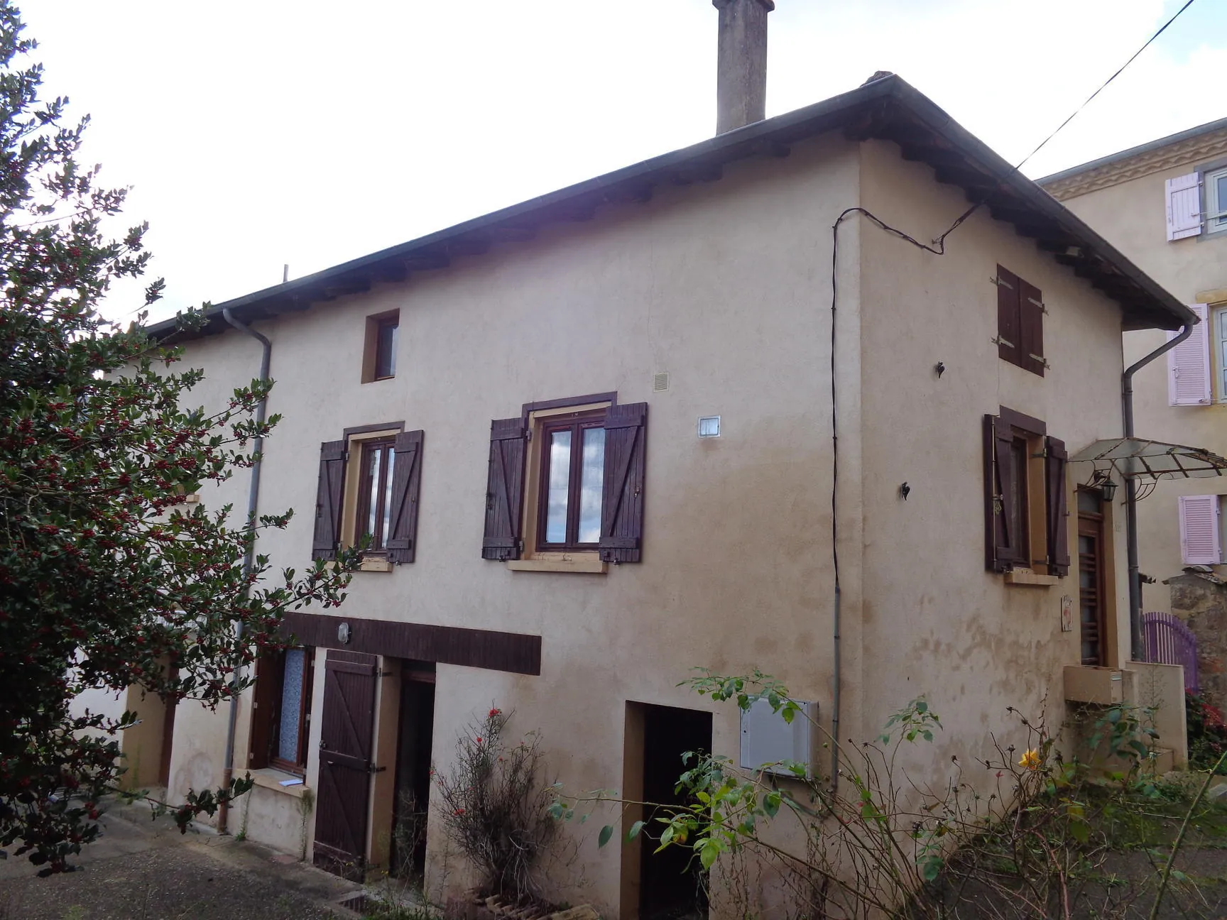 Maison à vendre avec jardin, garage et potentiel d'aménagement à Saint-Nizier-d'Azergues 