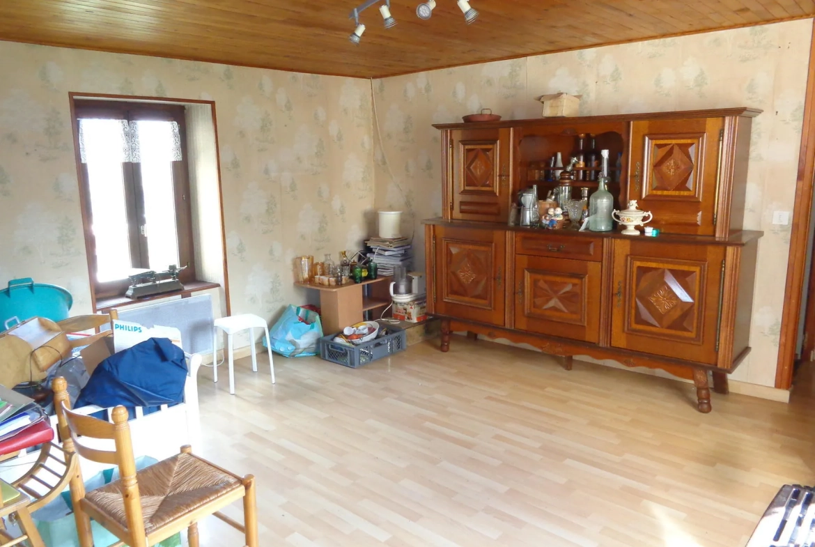 Maison à vendre avec jardin, garage et potentiel d'aménagement à Saint-Nizier-d'Azergues 