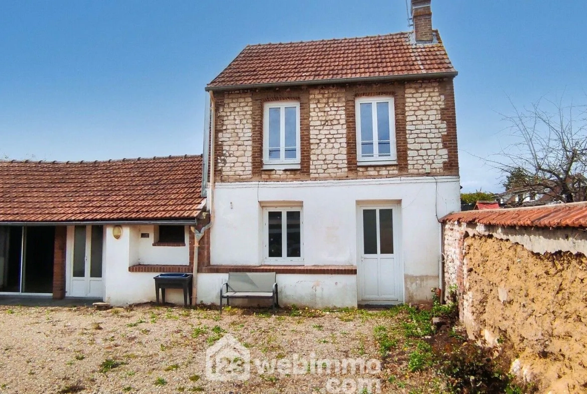 Maison à rafraîchir de 86 m² à Incarville avec 3 chambres et jardin clos 