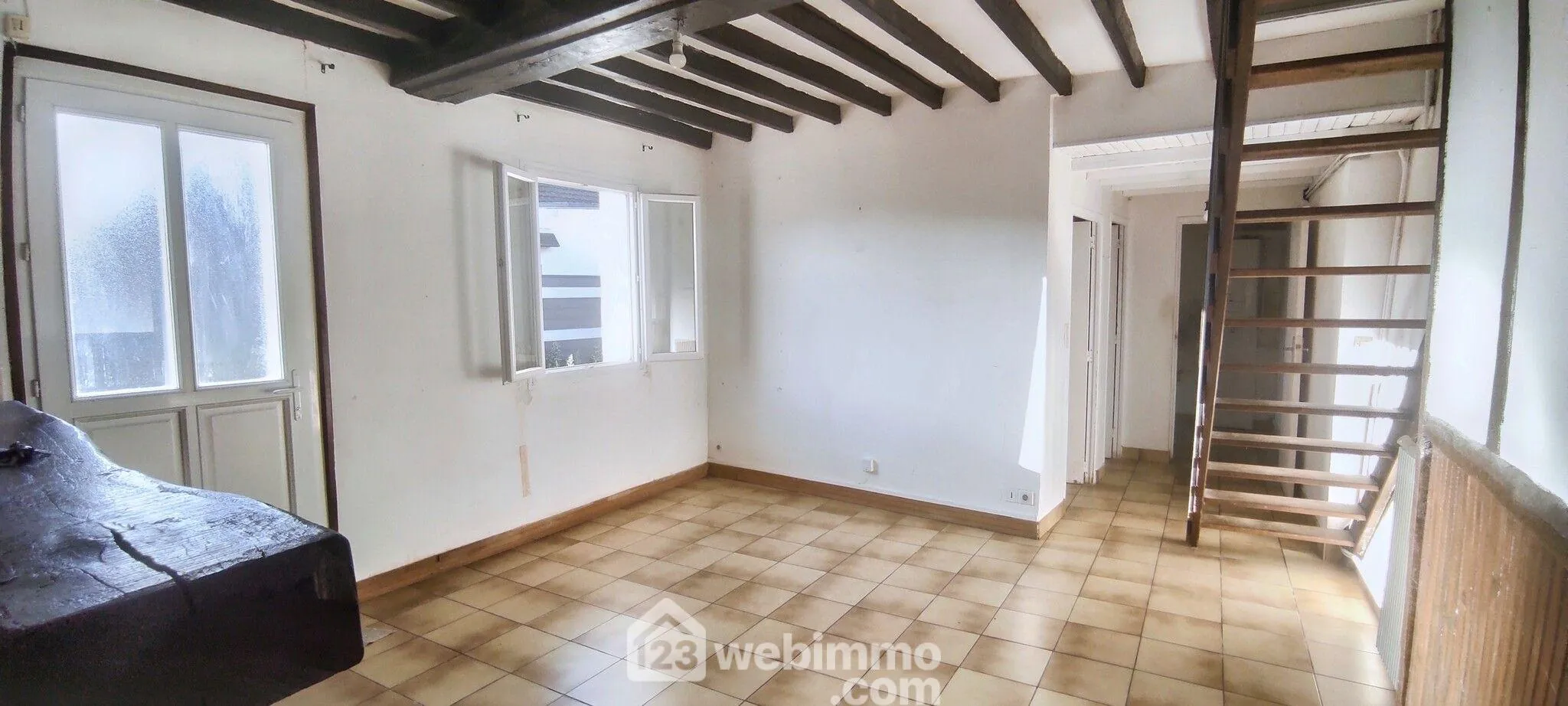 Maison à rafraîchir de 86 m² à Incarville avec 3 chambres et jardin clos 