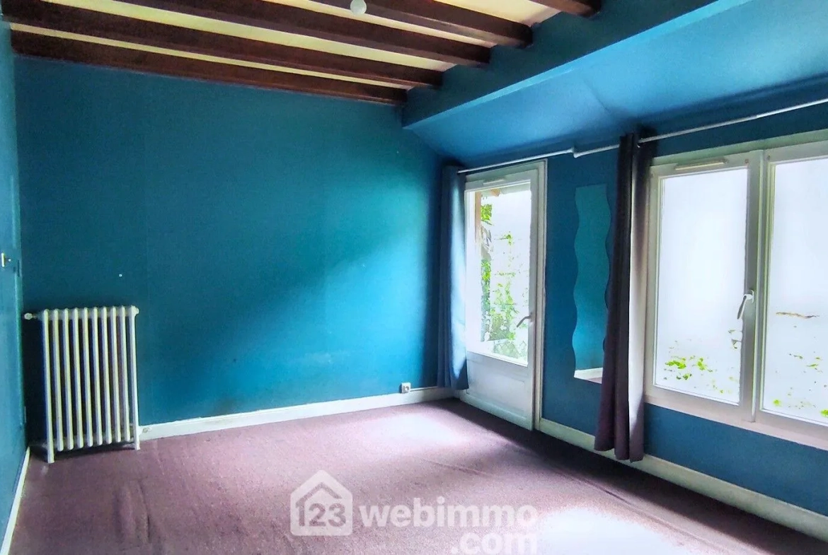 Maison à rafraîchir de 86 m² à Incarville avec 3 chambres et jardin clos 