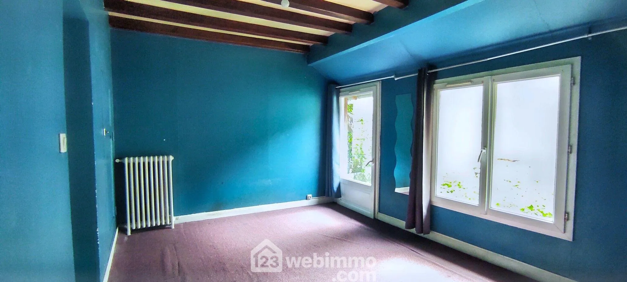 Maison à rafraîchir de 86 m² à Incarville avec 3 chambres et jardin clos 