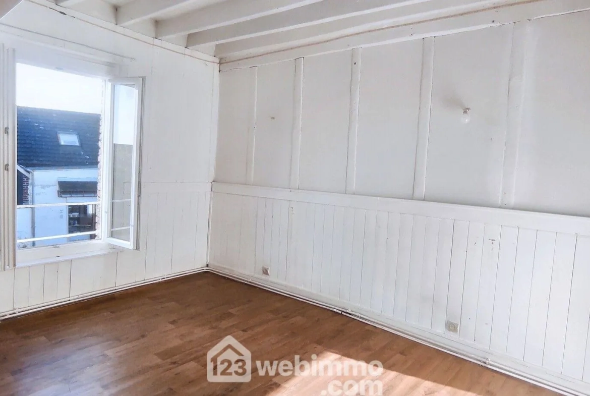 Maison à rafraîchir de 86 m² à Incarville avec 3 chambres et jardin clos 